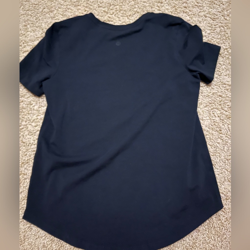 Lululemon t shirt 
Size 6
Color: black